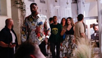 Tristan Thompson holds hands with a mystery woman before the baby's birth in Greece