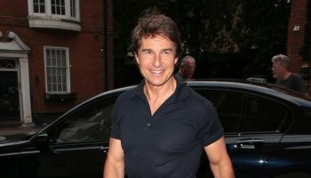 As he heads out for a fancy dinner in London, Tom Cruise, 60, displays bulging biceps