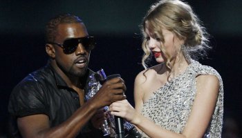 As she sings Kanye West, Taylor Swift chuckles